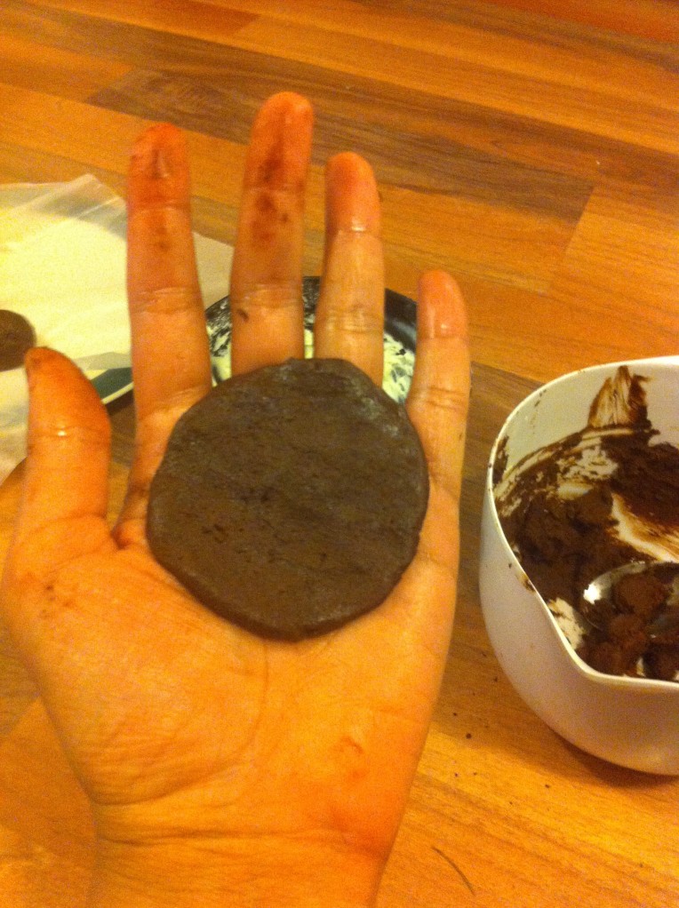 Shaping chocolate cream cheese truffles