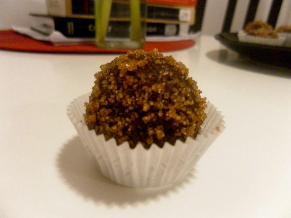 Brown sugar-coated chocolate truffles with orange-cream cheese centers