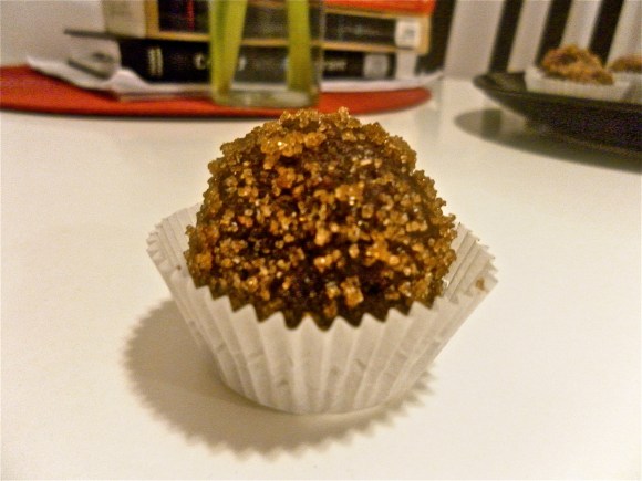 Brown Sugar coated chocolate truffle with orange-cream cheese center
