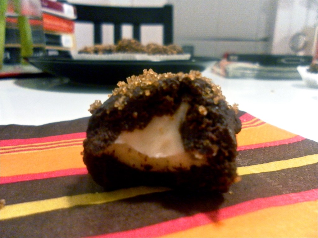 Sugar coated chocolate truffle with orange-cream cheese center