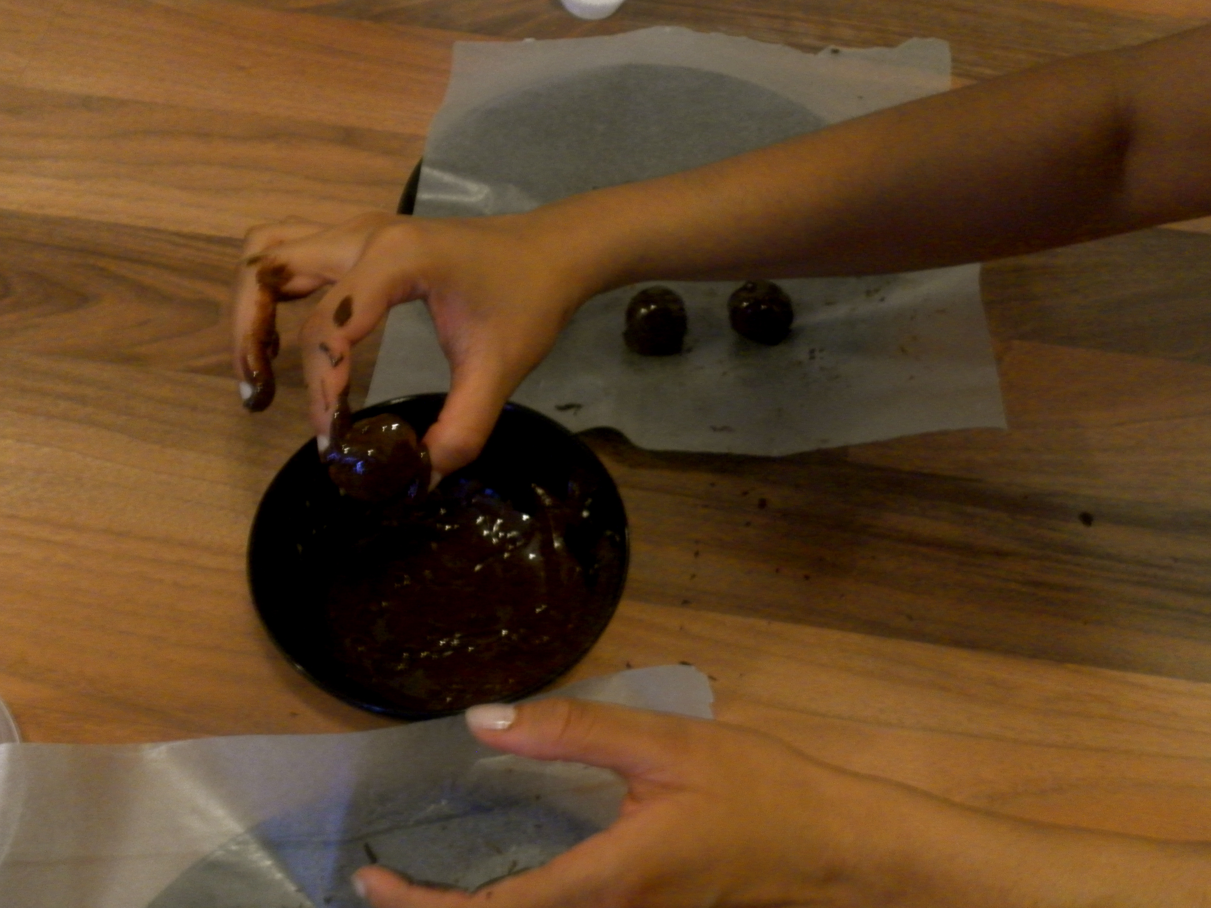 Dipping truffles in chocolate